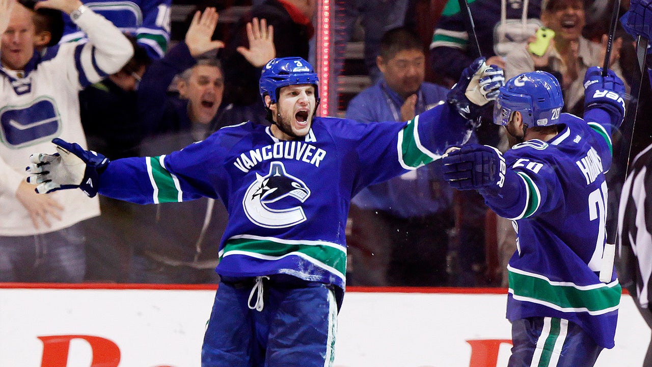 Bieksa's OT goal lifts Canucks past Coyotes